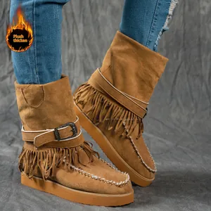 Stylish brown suede snow boots featuring bohemian tassel trim and warm plush thickened lining
