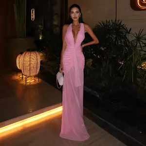 Elegant pink halter neck ruched maxi dress featuring a deep V-neck and mesh details