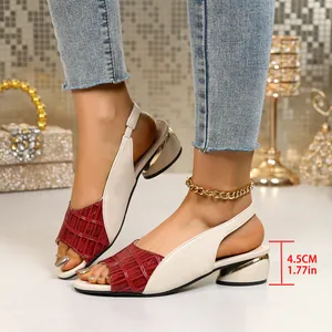 Close-up of stylish two-tone block heel sandals showing the 4.5cm heel height detail