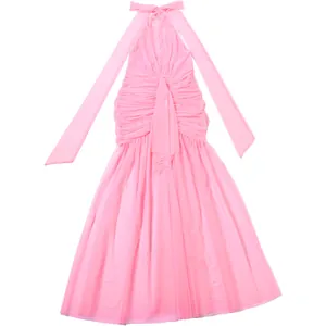 Detailed view of pink halter neck dress featuring pleated bodice and layered mesh skirt