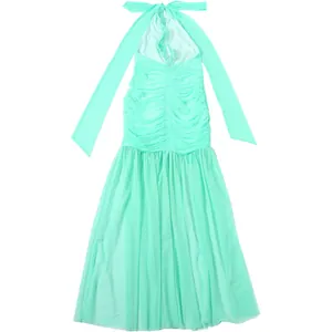 Macro view of mint green halter neck dress featuring elegant ruched bodice and mesh skirt