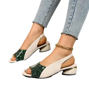 Fashionable two-tone peep-toe slingback sandals with chunky heel and crocodile texture detail