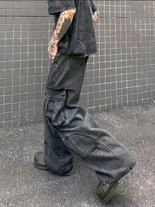Men's retro loose straight-leg cargo jeans in washed grey, street style side view