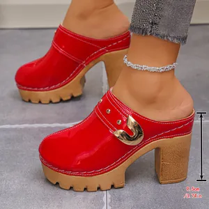 Stylish red patent leather platform mules with chunky high heels and gold buckle