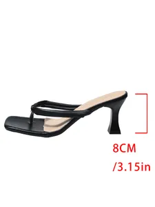Detailed side view of black square-toe thong sandal showing the specific 8cm heel height