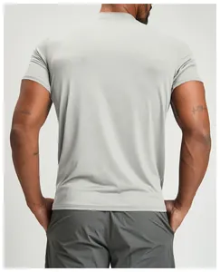 Back view detail of a light grey breathable men's short-sleeve fitness sports t-shirt