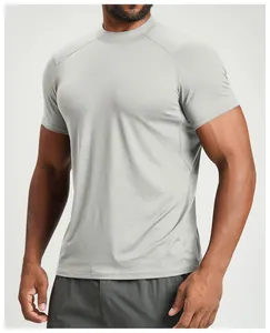 Close-up detail of grey men's athletic t-shirt showing breathable fabric and slim fit design