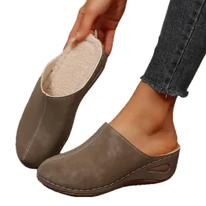 Comfortable fleece-lined warm slip-on clogs for women in taupe with a wedge sole