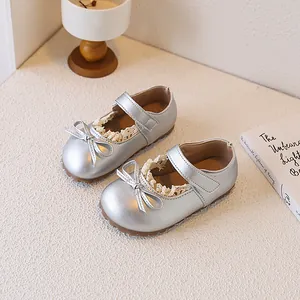 Silver girls' Mary Jane shoes featuring delicate lace trim and cute bow decoration