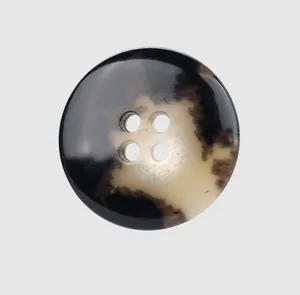 High-resolution macro detail of high-end marbled urea button for premium workwear garments.