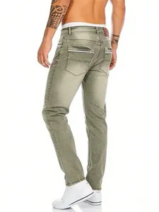 Back view of men's faded green straight-leg jeans with hip hop pocket detailing.