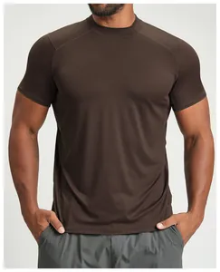 Close-up of a men's breathable dark brown athletic t-shirt showing fit and texture.