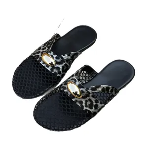 Elegant French style flat pointed-toe mules with black mesh and leopard print straps