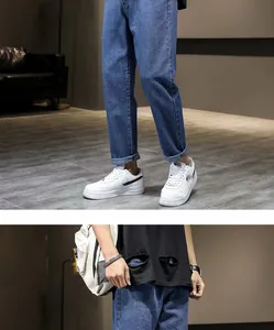 Detail van de blauwe slim-fit stretch denim jeans voor heren in zomerse stijl.