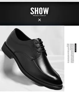 Macro shot of a classic black men's business dress shoe with textured leather details