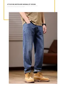 Loose fit stretch straight leg men's denim blue jeans in casual lifestyle setting