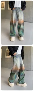 Close-up detail of baggy wide-leg jeans with vibrant rainbow gradient tie-dye wash