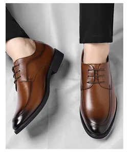 Detailed close-up of brown gradient leather dress shoes for men with textured panels