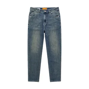 Men's loose straight-leg stretch jeans in classic denim blue on white background