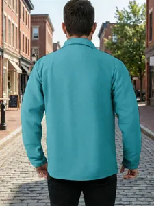 Vue arrière d'une veste de travail décontractée bleu sarcelle texturée pour hommes.
