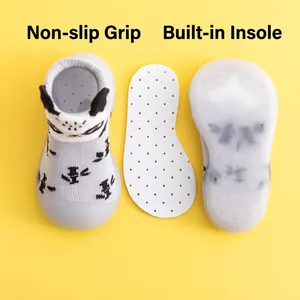 Cute baby walking sock shoes with non-slip dotted sole and breathable white insole
