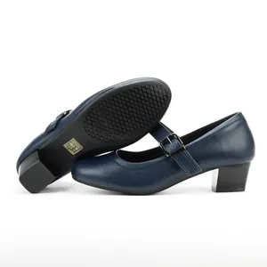 Side and sole detail view of navy blue Mary Jane shoes with chunky heel and buckle strap
