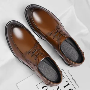 Polished brown men's business formal dress shoes with lace-up design