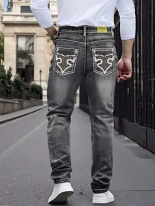 Men's stylish slim-fit gray washed denim jeans featuring unique back pocket embroidery design