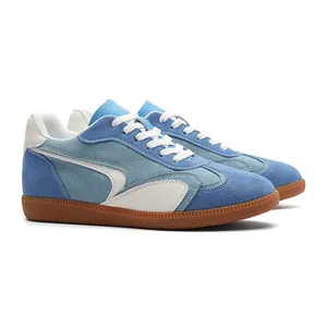 Light blue retro German Army Trainer sneakers with suede leather patchwork and gum sole