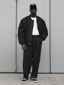 Pantaloni eleganti neri da uomo larghi a gamba dritta con fodera in pile per l'autunno