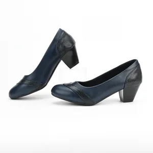Close-up of dark blue chunky heel pumps with elegant black snake-skin texture