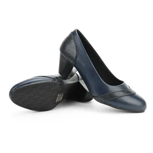 Detailed view of navy blue square toe pumps with snakeskin texture accents