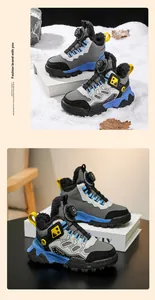 Warm boys winter sports shoes featuring faux fur lining and rotary buckle closure.