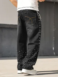 Detailed view of black rhinestone-studded loose straight jeans for men