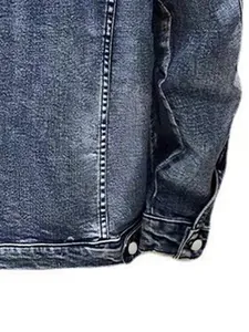 Detailed close-up view of a men's classic denim jacket with durable stitching and buttons