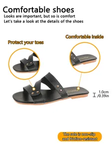 Detailed view of women's vintage black flat sandals with rivet accents and non-slip sole.