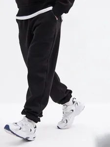 Men's black fleece sweatpants with elastic cuffs for a comfortable casual fit