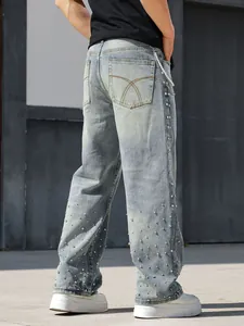 Back view of men's loose straight jeans with rhinestone embellishments and washed denim