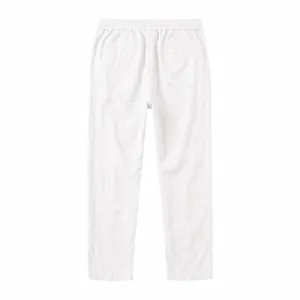 Back view of white cotton linen loose pants with elastic waist and single back pocket