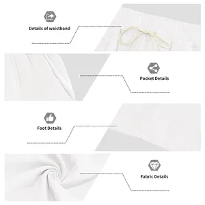 Detail view of white cotton linen pants showing waistband, pocket, and fabric texture