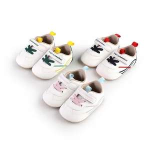 Detail view of baby pre-walker shoes in multiple colors with soft non-slip rubber soles
