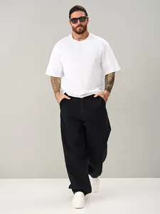 Full-body view of men's oversized black baggy denim jeans with loose straight fit