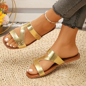 Retro metallic gold flat sandals for women with rivet details for summer beach wear