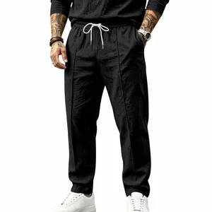 Men's casual black cotton linen loose straight leg vacation style drawstring trousers
