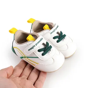 Detailed macro view of white baby prewalker shoes with magic prewalker velcro strap