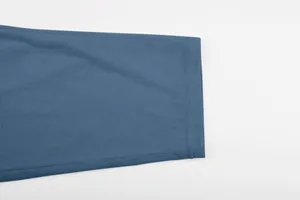 Macro view showing the blue corduroy textured fabric of men's summer casual set