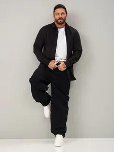 Men's plus-size baggy black jeans with a loose straight-leg fit for casual wear