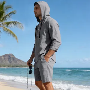 Casual grey men's linen hoodie and shorts set shown on a beach setting