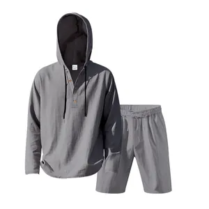 Detail view of men's grey linen casual set with hooded Henley top and loose shorts