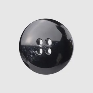 Classic round black resin button with four holes for premium clothing accessories